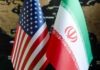Flags of the United States and Iran displayed together