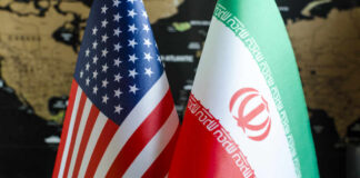 Flags of the United States and Iran displayed together