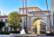 Entrance to Paramount Pictures with a fountain and palm trees