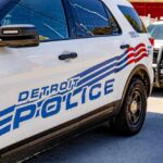 Close-up of a Detroit police vehicle with visible markings