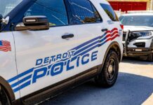 Close-up of a Detroit police vehicle with visible markings