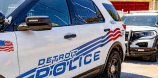 Close-up of a Detroit police vehicle with visible markings