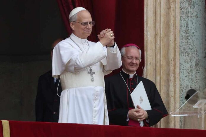 Pope giving a blessing from a balcony