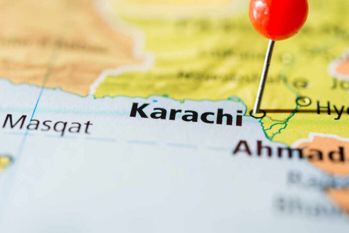 shutterstock_505948108.jpg Close-up of a map showing Karachi with a red location pin