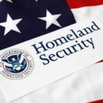 Homeland Security sign on American flag background