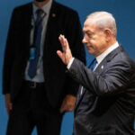 I dont know who this person is waving