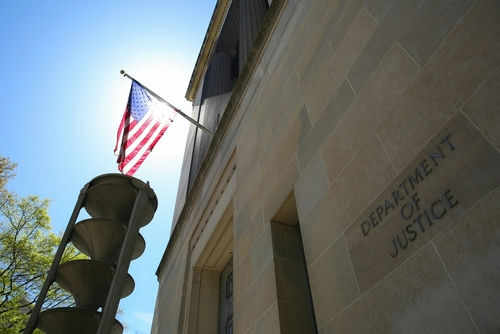 United States flag Department of Justice building exterior
