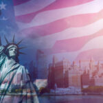 Statue of Liberty in front of a blurred New York City skyline with an overlay of the American flag