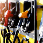 Close-up of multiple gas pumps at a fuel station