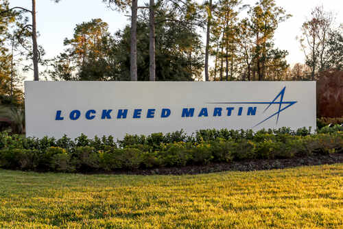 Sign displaying the Lockheed Martin logo in a landscaped area
