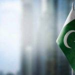Flag of Pakistan waving in an urban setting