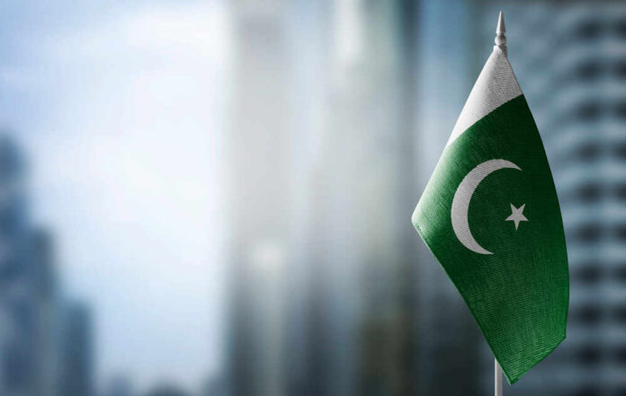 Flag of Pakistan waving in an urban setting