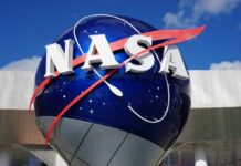 NASA logo displayed on a large globe structure