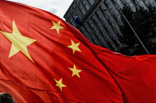 Close-up of the Chinese flag waving in the wind