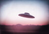 Hidden Truths: UFO Files Set to Shock UFO flying over mountains during sunset or sunrise