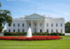 White House with fountain and flowers in front