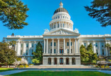 State capitol building with white dome and columns
