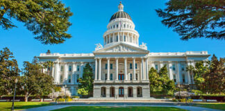 State capitol building with white dome and columns