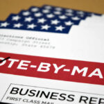 Vote-by-mail envelopes with U.S. flag design