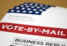 Vote-by-mail envelopes with U.S. flag design