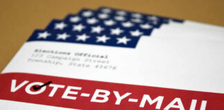 Vote-by-mail envelopes with U.S. flag design
