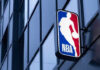 NBA logo on building exterior.