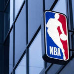 NBA logo on building exterior.