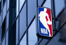 NBA logo on building exterior.