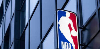NBA logo on building exterior.