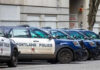 Row of Portland police cars parked on street.