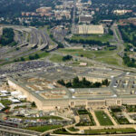 Aerial view of the Pentagon surrounded by roads and greenery