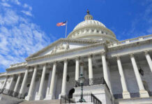 United States Capitol building with American flag flying
