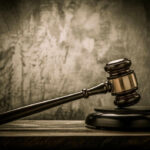 The Victim’s Final Words Could Decide Everything Judges gavel on a dark wooden surface.