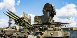Tracked military surface-to-air missile launcher with radar