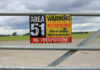 Area 51 warning sign on metal fence