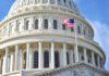 US Capitol dome with American flag flying