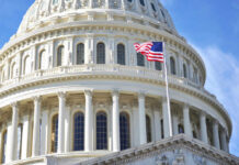US Capitol dome with American flag flying