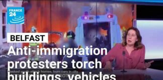 Anti-immigration protesters torch buildings and vehicles, block roads over Belfast stabbing