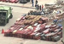 Bodies overwhelm Venezuela port as relatives identify loved ones