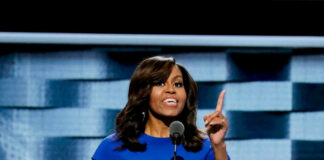 I dont know who this is speaking at a podium