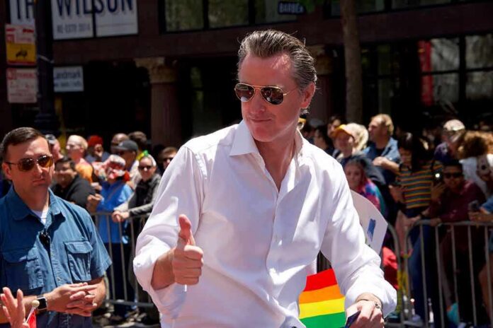 Man in white shirt giving thumbs up at a pride parade