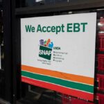 storefront sign stating EBT accepted