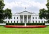 Shocking Health Update Jolts Power Circles The White House with fountain and red flower bed
