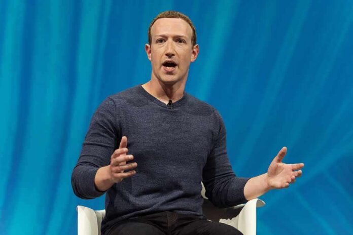 man speaking on stage with hands gesturing