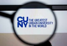 Magnifying glass focusing on CUNY logo on a screen