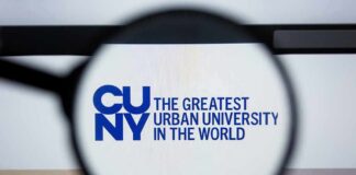 Magnifying glass focusing on CUNY logo on a screen