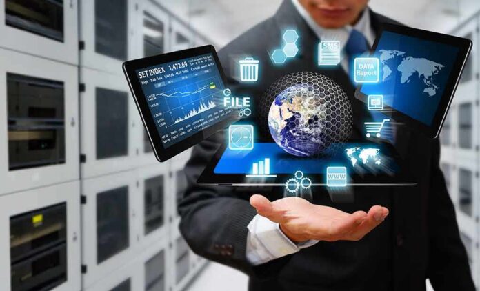Businessperson holding a digital tablet with floating data icons