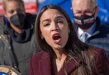 woman speaking passionately at outdoor event