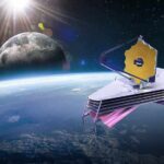 space telescope with gold hexagonal mirror orbiting above Earth