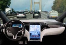 Self-driving car interior on a busy bridge highway